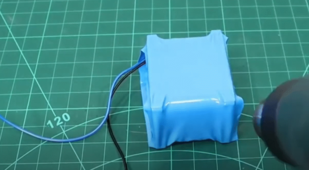 cover battery pack with heat shrink tubing
